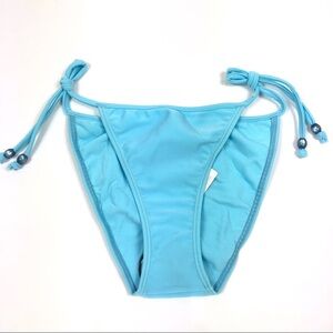 Agua Doce Cheeky bikini bottoms blue side ties